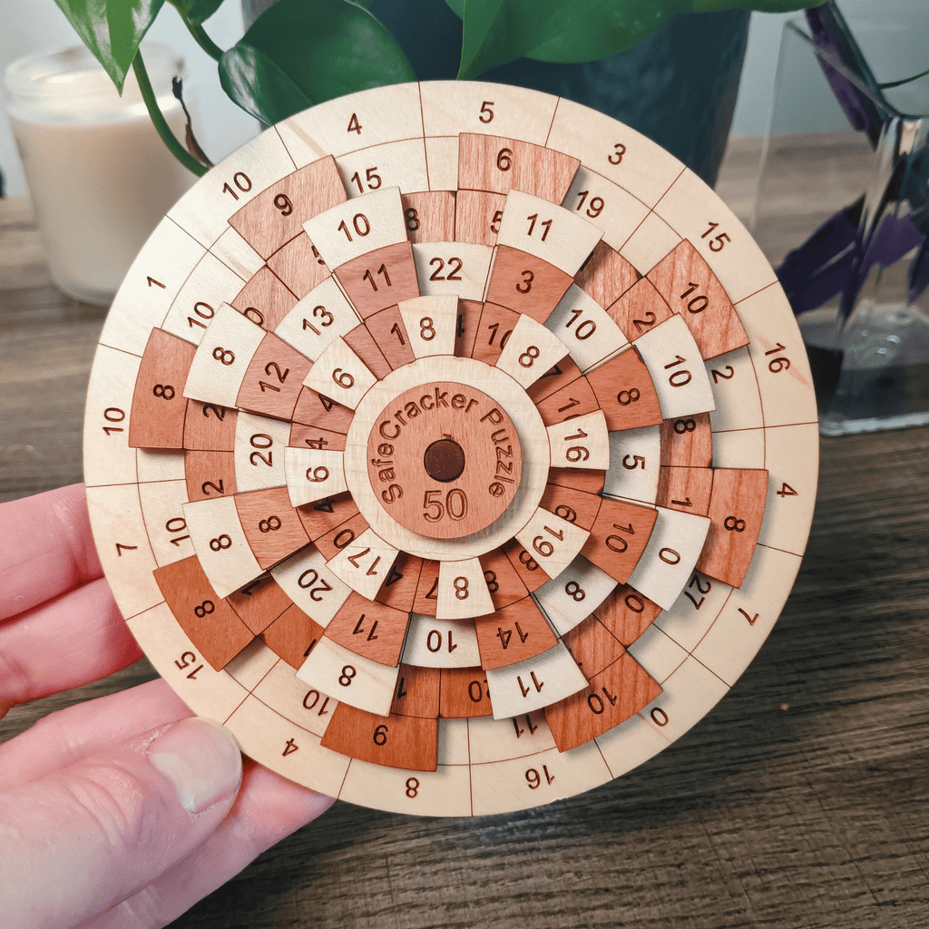 Safecracker 50 puzzle rings rotated to show how number visibility changes with notched layers